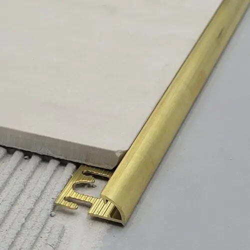 afslutningsprofil til fliser kvartrundt messing natur