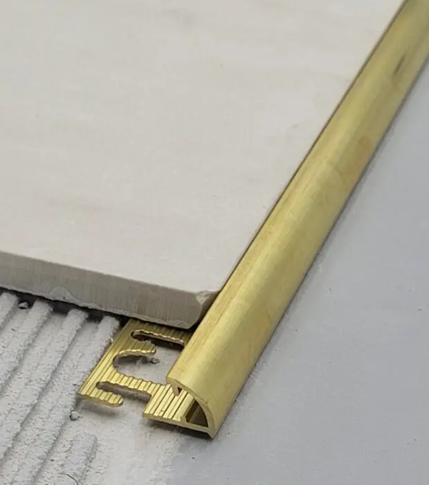 afslutningsprofil til fliser kvartrundt messing natur